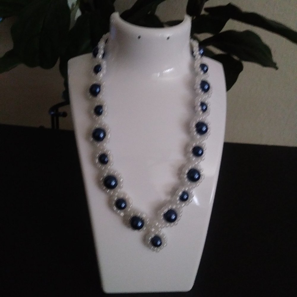 Glass Rondelle necklace with navy blue beads and white mostacillas.